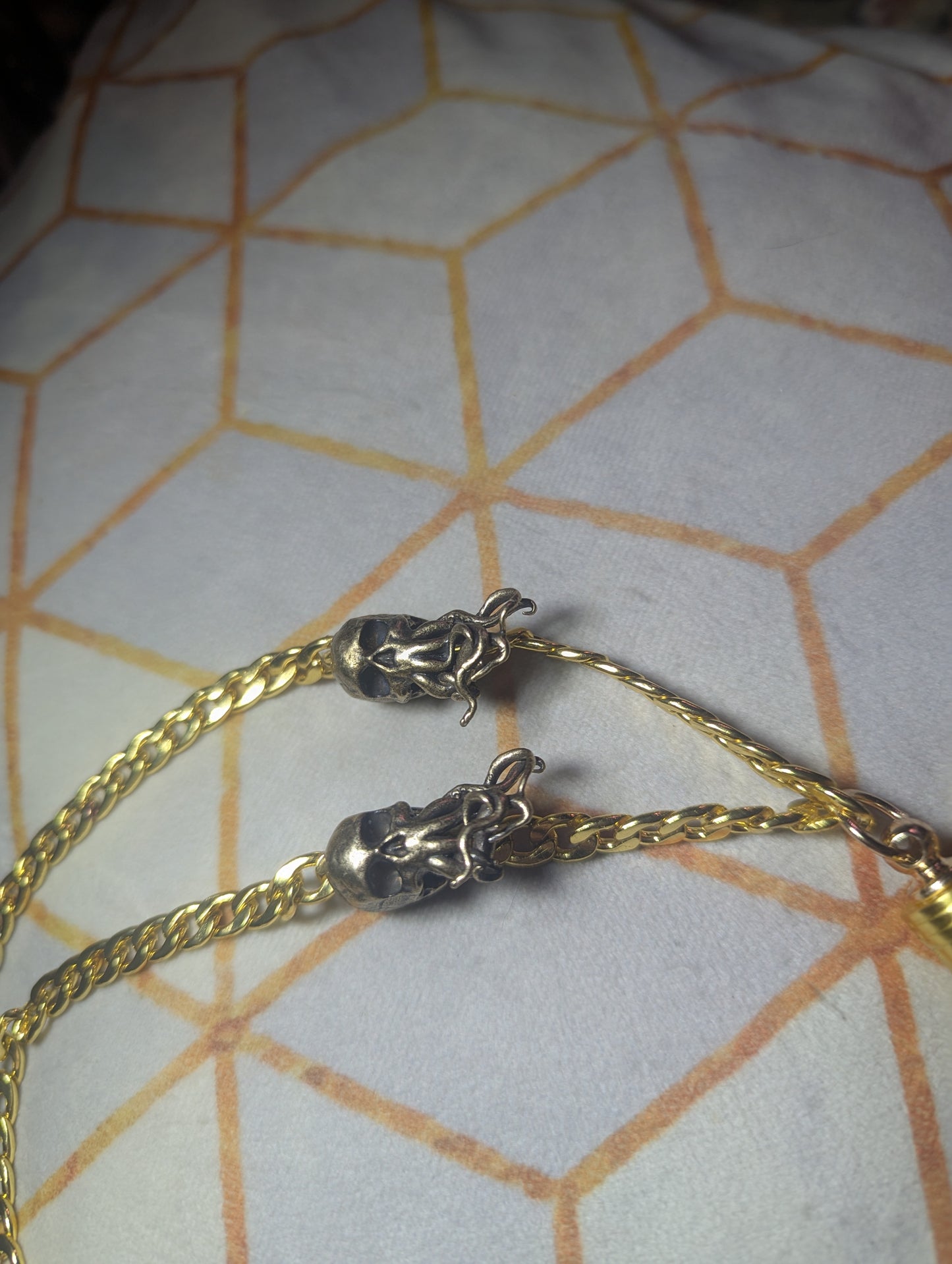 LitChain- gold scheme with cthulhu beaded embellishments