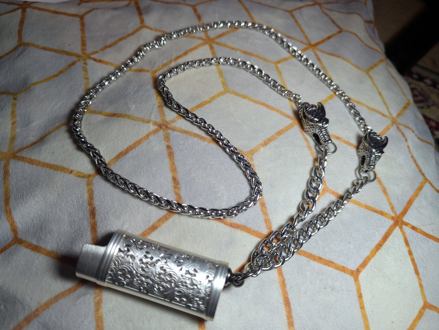 LitChain- silver dragonhead embellished lighter chain necklace.